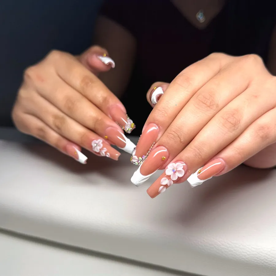 Coffin acrylic set with white French tips, 3D flowers and rhinestones by Legacy Nail Studio, Austin TX