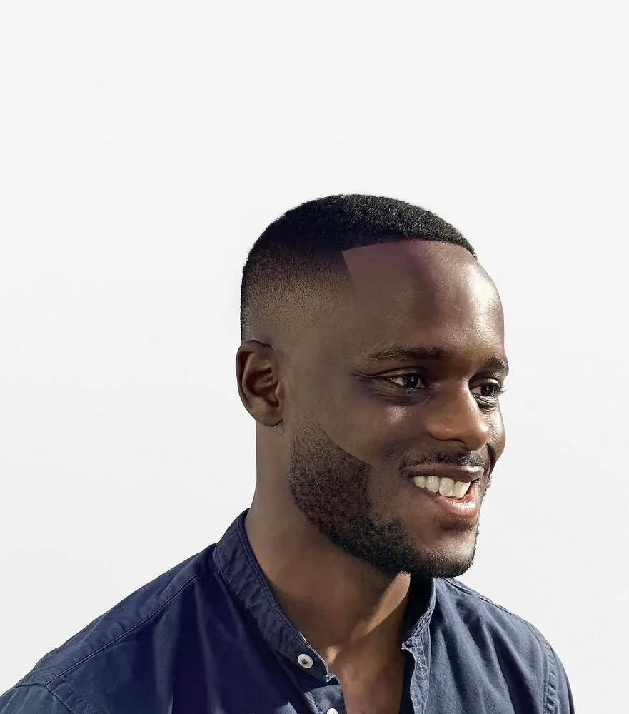 Skin fade haircut by Legacy Barbershop