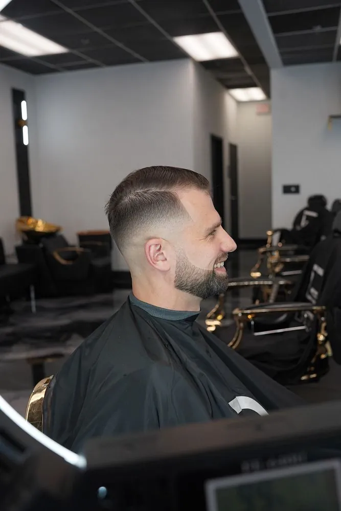 Low fade with blended beard by Legacy Barbershop