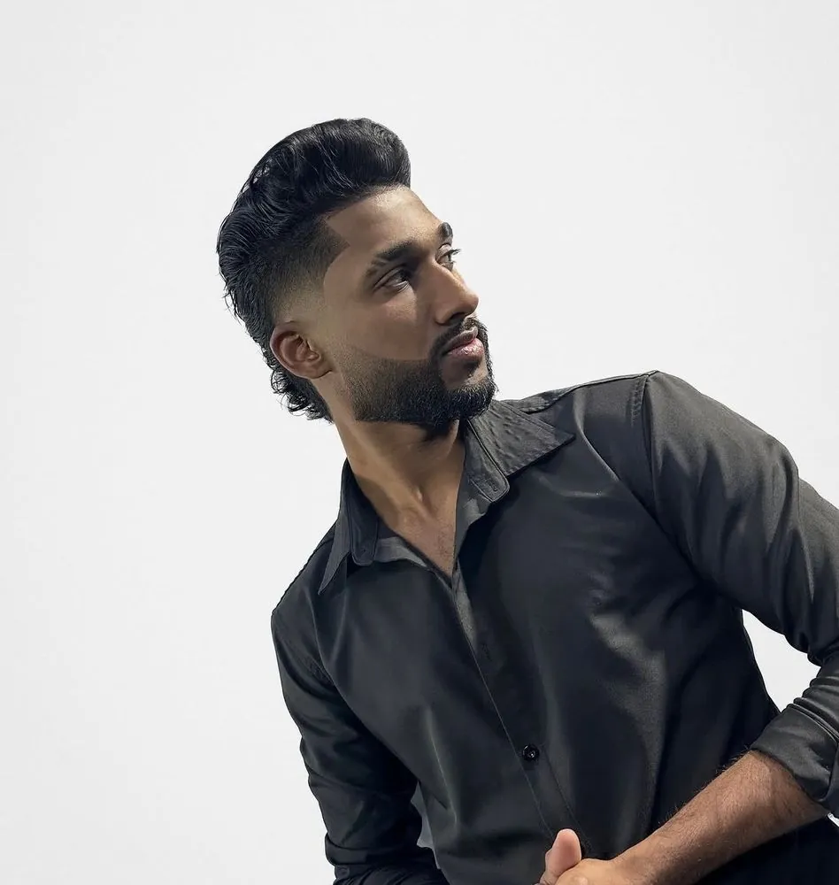 Pompadour fade with sculpted beard by Legacy Barbershop